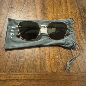 Stylish Black and Gold Sunglasses By AIRE.